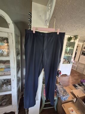 Alberto Cardinali pants are sized W34L32 and made from a polyester-rayon blend.